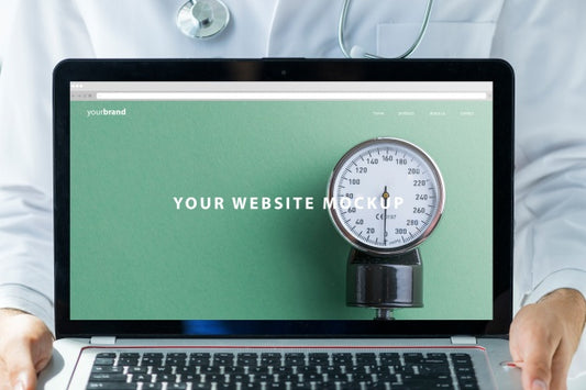 Free Doctor Holding Laptop Mockup For Website Psd
