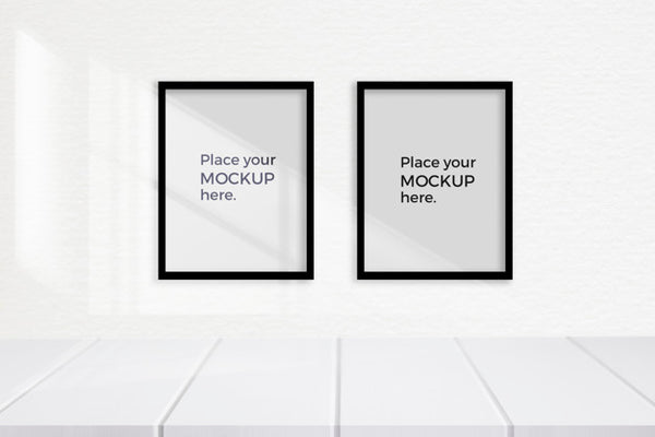 Free Empty White Room With Frames Mockup On The Wall Psd