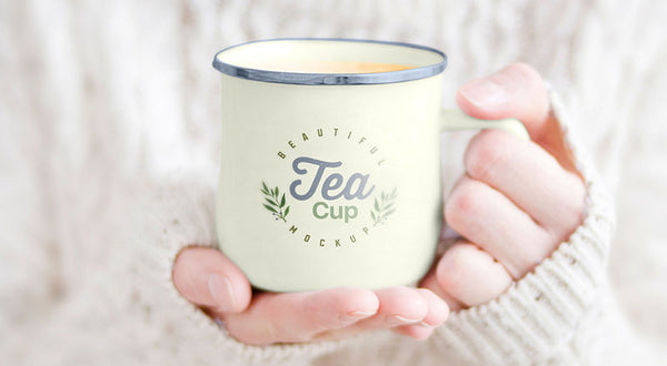 Free Female Holding Tea Cup Mockup Psd