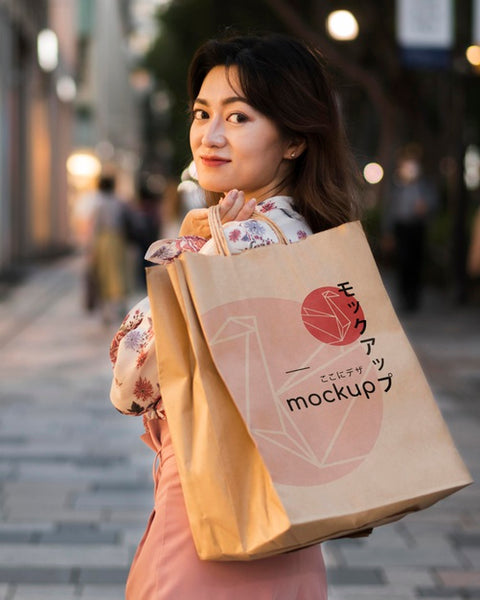 Free Female Walking Outdoors With Shopping Bag Psd