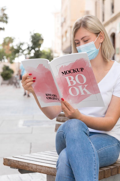 Free Female With Mask On Street Reading Book Psd