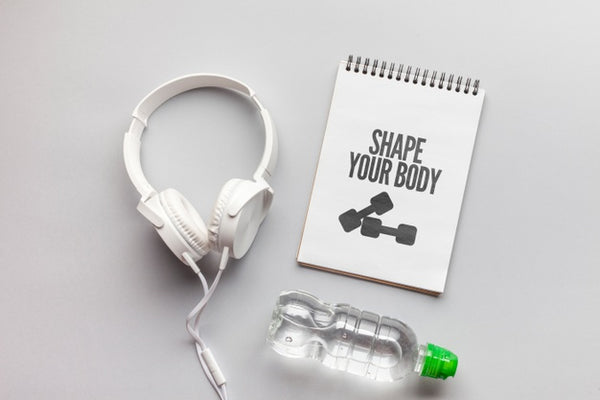 Free Fitness Message Mock-Up And Headphones Psd