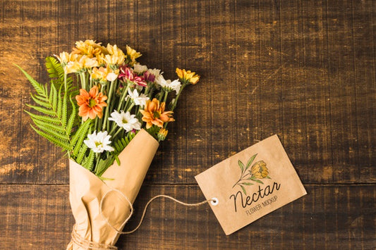 Free Flat Lay Bouquet Of Flowers With Mock-Up Tag Psd