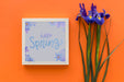 Free Flat Lay Frame Mockup With Spring Flowers Psd