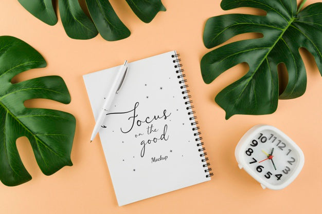 Free Flat Lay Notebook And Monstera Plant Psd