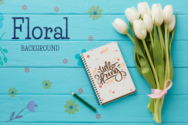 Free Flat Lay Of Bouquet Of Tulips With Notebook Psd