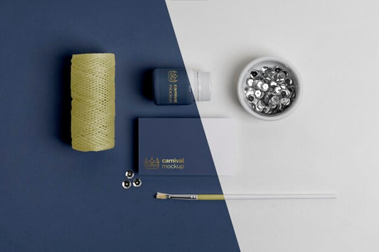 Free Flat Lay Of Carnival Invitation With Thread And Paint Brush Psd