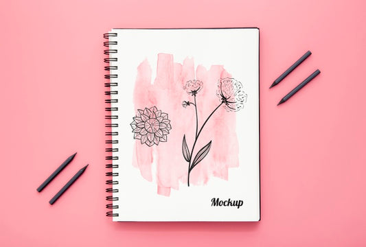 Free Flat Lay Of Desk Surface With Notebook And Pencils Psd