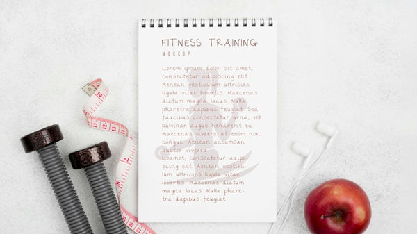Free Flat Lay Of Fitness Notebook With Apple And Weights Psd