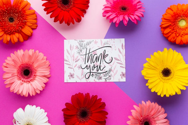 Free Flat Lay Of Letter With Colorful Flowers Psd