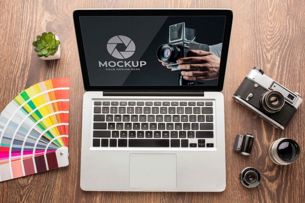 Free Flat Lay Of Photographer Wooden Workspace With Laptop Psd