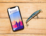 Free Flat Lay Of Smartphone With Fish Bait Psd