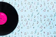 Free Flat Lay Of Vinyl On Plain Background Psd