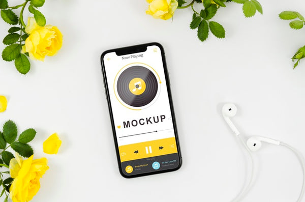 Free Flat Lay Smartphone Mock-Up With Flowers And Earphones Psd