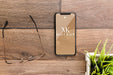 Free Flat Lay Smartphone Mock-Up With Glasses On Desk Psd