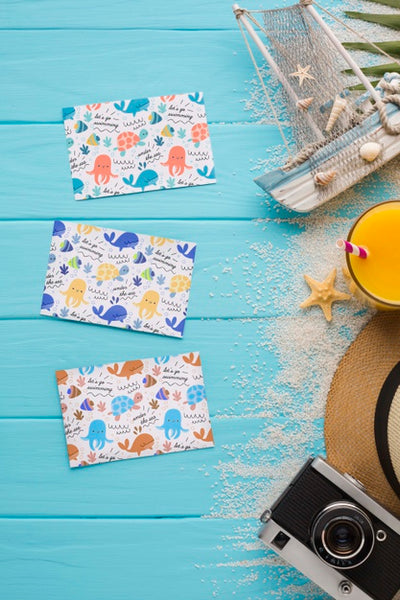 Free Flat Lay Summer Cards On The Table With Mock-Up Psd
