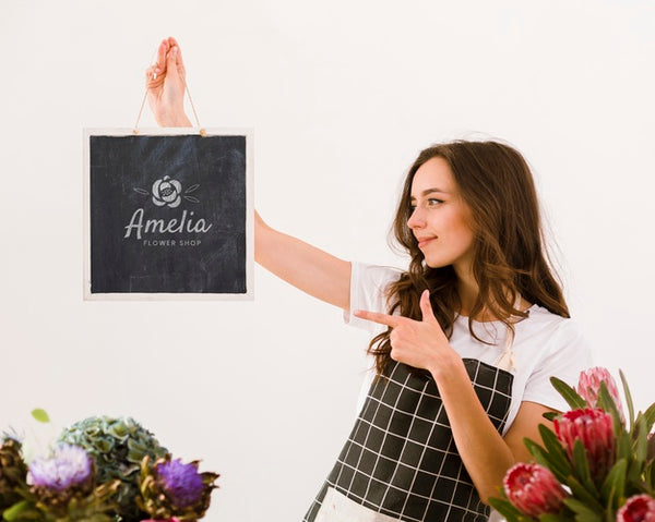 Free Florist Holding Mock-Up Sign Psd