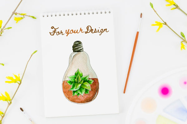 Free Flowers Next To Notebook With Draw Psd