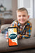 Free Front View Of Defocused Kid On Couch Holding Smartphone Psd