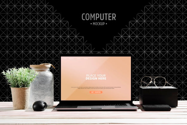 Free Front View Of Desk With Plant And Laptop Psd