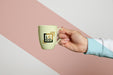 Free Front View Of Hand Held Mug Psd
