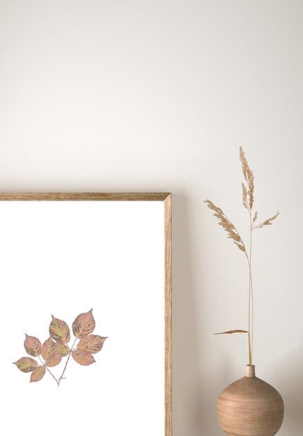 Free Front View Of Vase With Flowers And Frame Decor Psd