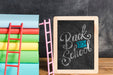 Free Front View Pile Of Books With Chalkboard Psd