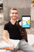 Free Front View Student Holding Tablet Psd