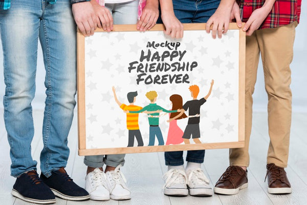 Free Group Of Children Holding Mock-Up Sign Together Psd