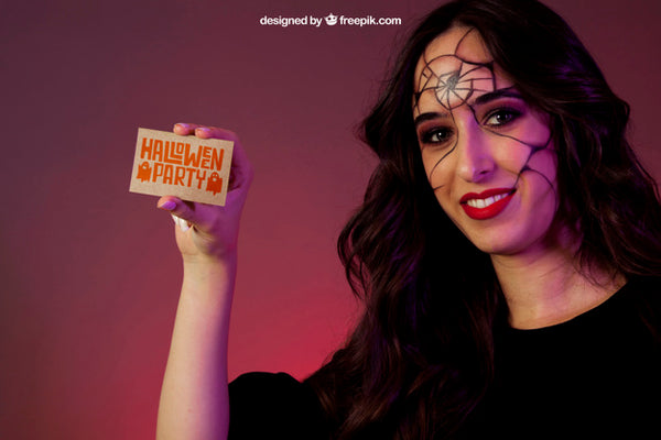 Free Halloween Mockup With Girl Showing Business Card Psd