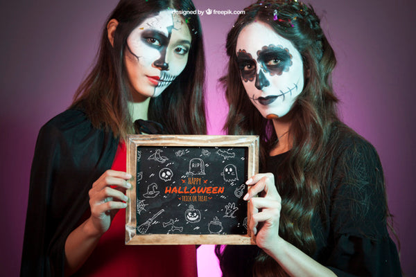 Free Halloween Mockup With Women Holding Slate Psd