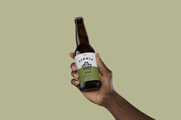 Free Hand Holding Beer Mockup