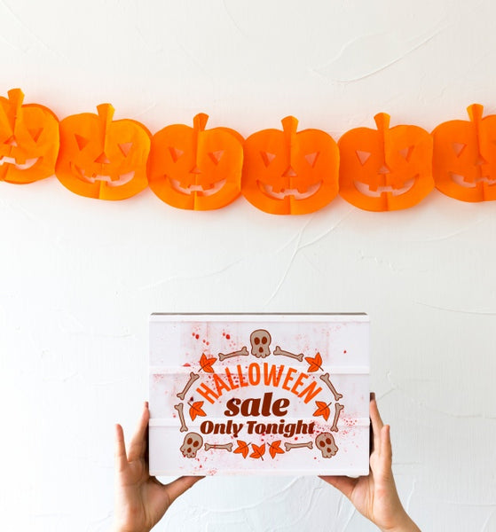 Free Hand Holding Box With Halloween Concept Psd