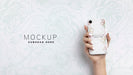 Free Hand Holding Smartphone With Mockup And Copy Space Psd