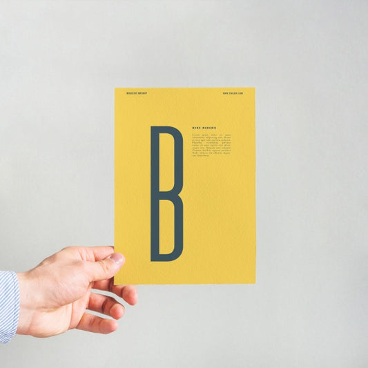 Free Hand Holding Yellow Paper Mockup Psd
