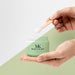 Free Hands Holding Beauty Product Mock-Up Psd
