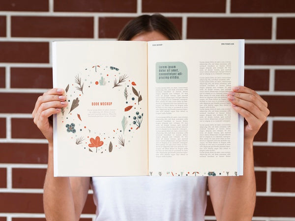 Free Hands Showing A Nature Magazine Mock Up Psd