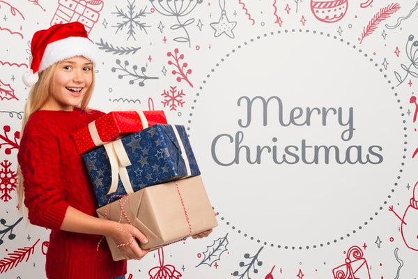 Free Happy Girl Holding Stack Of Gifts For Christmas Psd