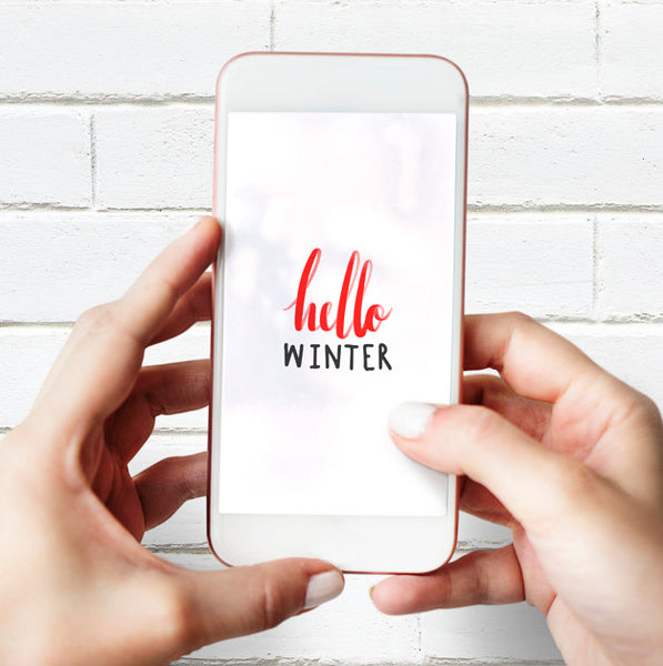 Free Hello Winter On A Mobile Phone Screen Mockup Psd