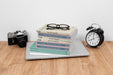 Free High Angle Books, Camera And Glasses Psd