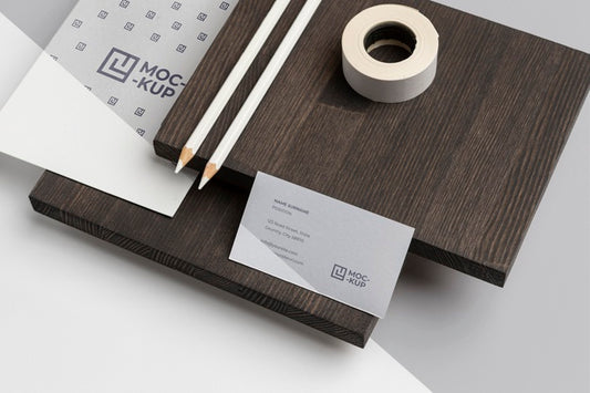 Free High Angle Mock-Up Stationery On Wood Composition Psd