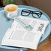 Free High Angle Open Book Mock-Up On Coffee Table With Glasses Psd