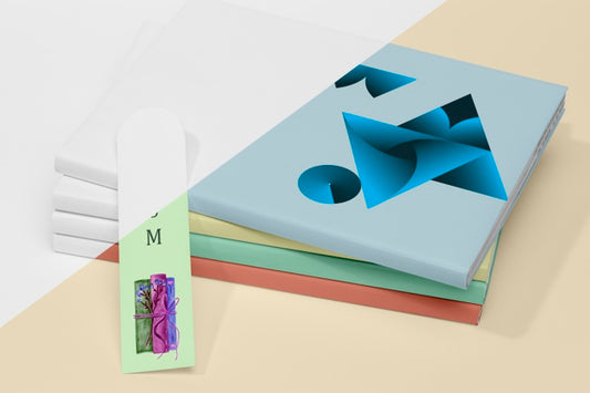 Free High Angle Stack Of Books Mock-Up With Bookmark Psd