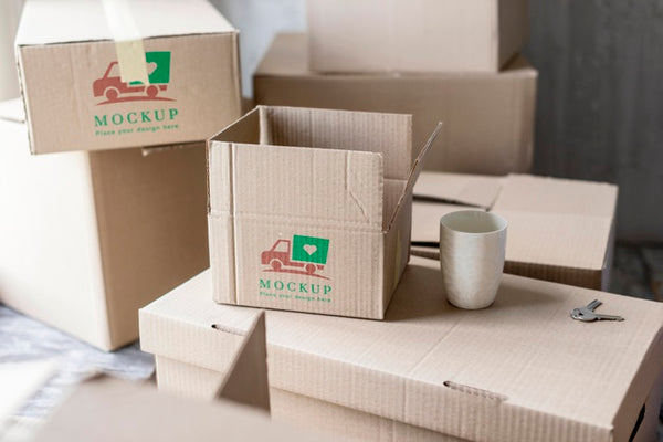 Free High View Moving House Boxes And Cup Of Coffee Psd