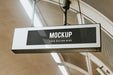 Free Indoor Board Mockup Hanging From A Ceiling Psd