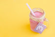 Free Jar Mockup With Pink Yogurt Psd