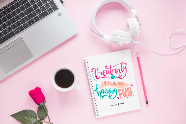 Free Laptop Headphone And Notebook On Pink Background Psd