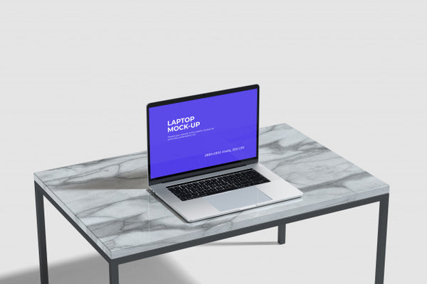 Free Laptop Mockup On The Ceramic Table Psd