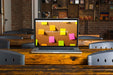 Free Laptop Mockup On Wooden Table Psd