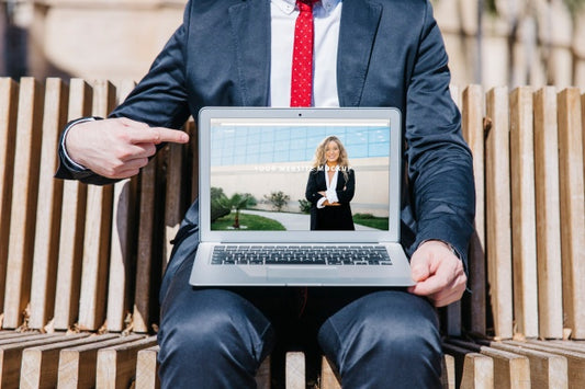 Free Laptop Mockup With Businessman Psd
